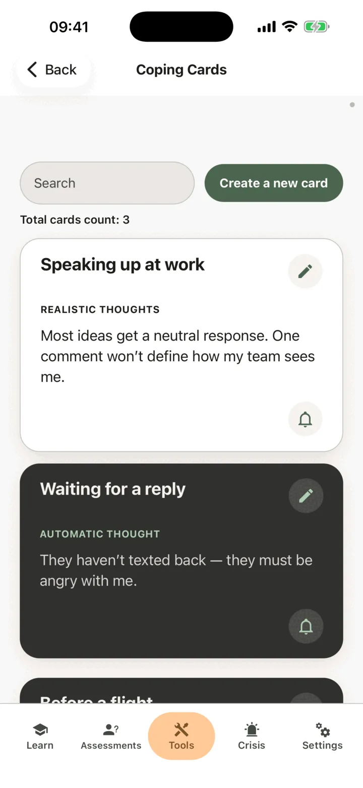A coping card flipped to its back, showing the realistic thoughts