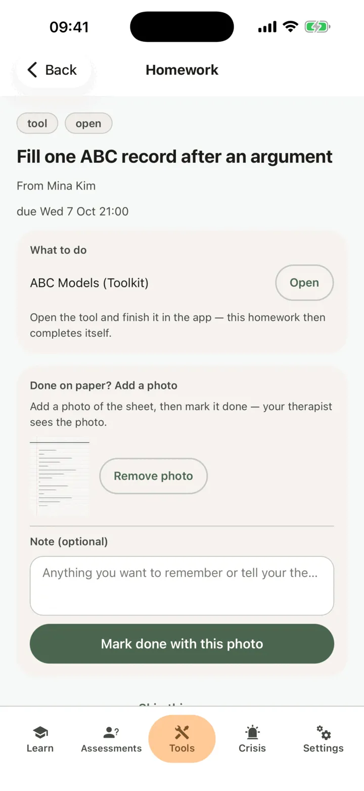 A tool homework with Done on paper, a photo of the sheet chosen, Remove photo, a Note box and the Mark done with this photo button