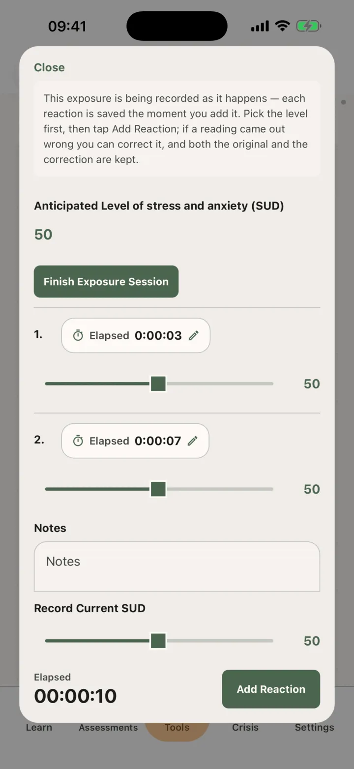 A live exposure session with the current stress slider, the elapsed time, the Add Reaction button, the readings so far, the notes box and the Finish Exposure Session button