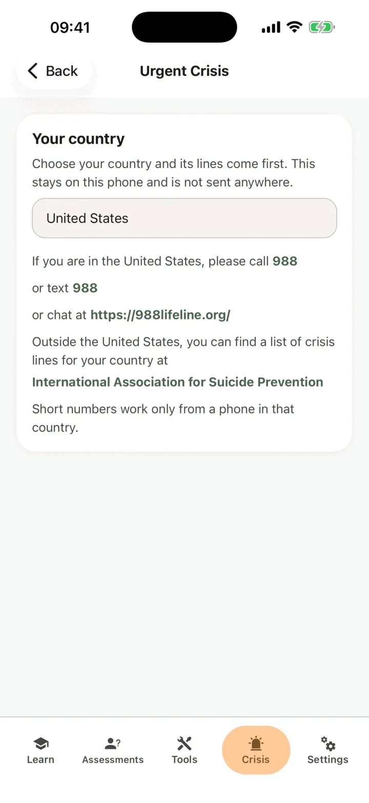 The Urgent Crisis screen with the Your country control and the list of help lines and links